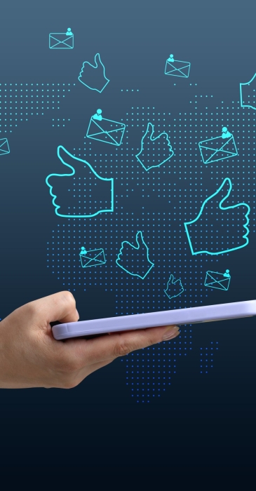 Mobile phone notifications for published news, likes and comments in the global social network. A woman's hand holds a phone on a blue background.